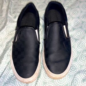 Leather black checker board slip on vans